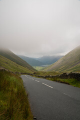 Road extends into the distance towards mountains