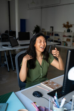 Happy businesswoman in office