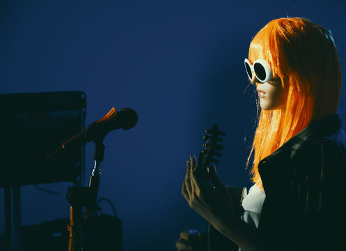 Mannequin Playing Guitar with Human Hands