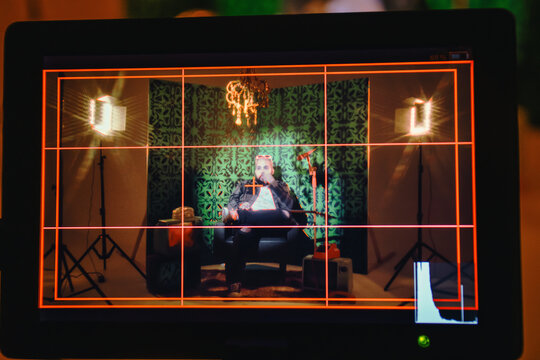 Artist Recording Videoclip with Studio Monitor