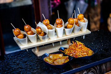 Fototapeta premium Japanese street food snacks available for purchase in Kyoto, Japan