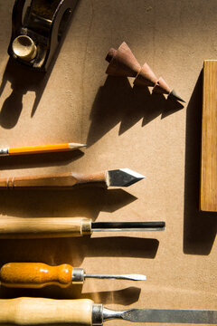 Professional Woodworking Tools Laid Out on a Workbench 