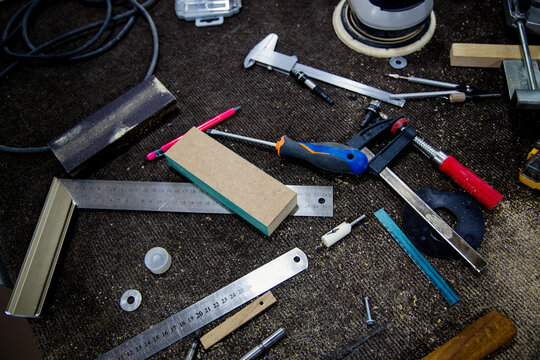 Disarray of Tools and Materials on a Workbench During a Project