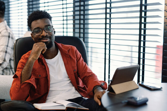 Young man creating business plan 