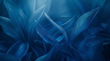 An ethereal display of intricate blue leaves captured in a detailed, close-up macro photograph. Background with copy space. 