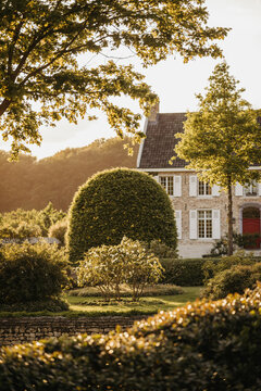 Rural European countryside home on a sunny evening