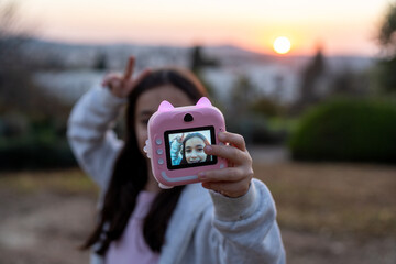 Sunset Selfie With Playful Instant Kids Camera.