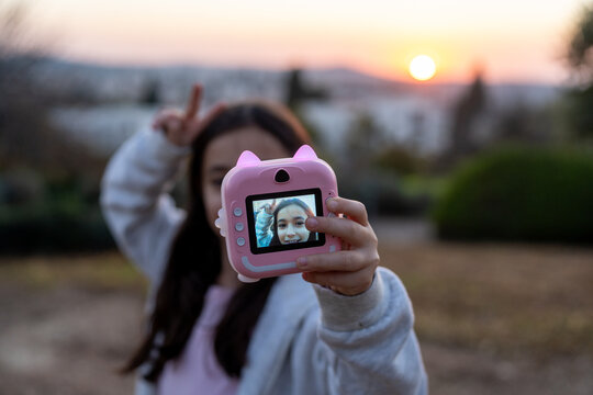 Sunset Selfie With Playful Instant Kids Camera.