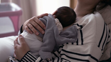 Affectionate Maternal Scene - Exhausted Mother in Bed, Holding Newborn on Chest in First Week of...