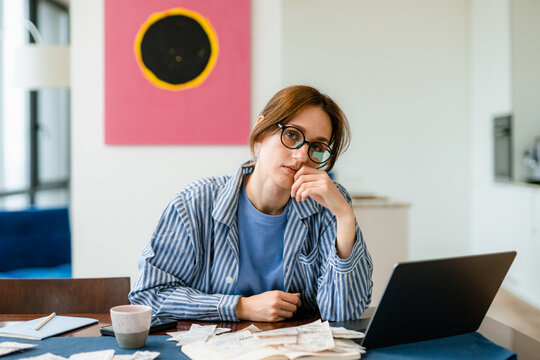 A woman considers the costs