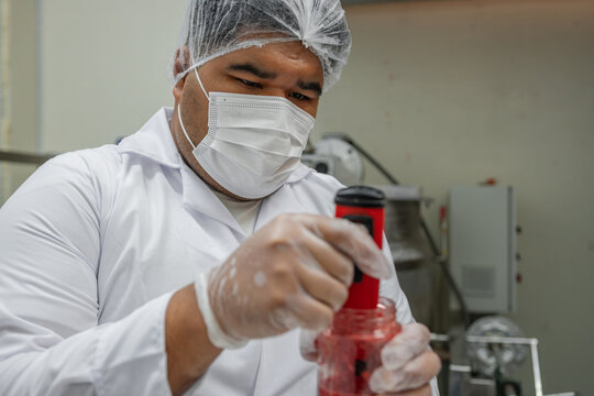 Food Industry Plus Size Worker Using Technology