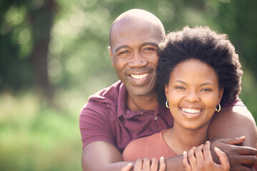 Black couple, hug and love in field for portrait, affection and support in outdoor nature to...