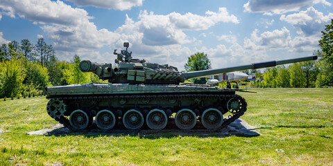 tank t80, armored vehicles with dynamic protection unit on street in green khaki color