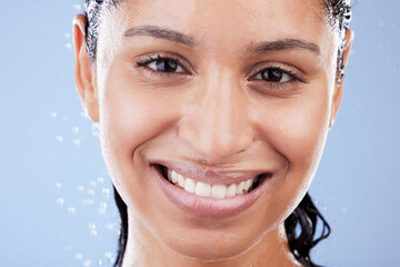 Portrait, shower and smile with black woman in studio isolated on blue background for skincare....