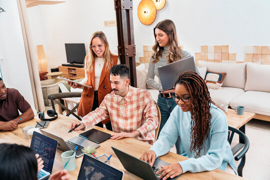 Collaborative team having casual meeting in office