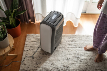 turning on air purifier at home