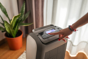 turning on air purifier at home