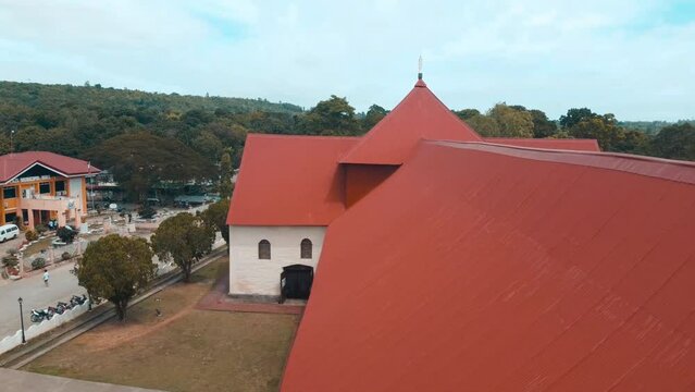 Drone footage of the Catholic church of San Isidro Labrador (Lazi Church) in Lazi, Philippines