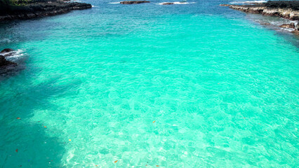 Amazing Bateria beach with palm trees and turqoise water in ilheu das rolas, Sao tome, Africa