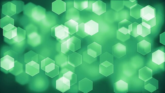 Hexagonal Green Bokeh. Abstract Hexagons on a Blurry Soft Background. Looped video.