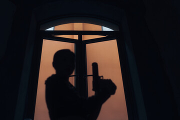 woman holding a pistol