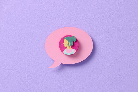 character lying on chat bubble on pastel color background