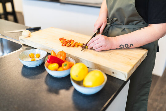 Cutting vegetables in cutting board