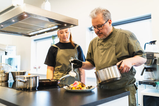 Chef working in food presentation