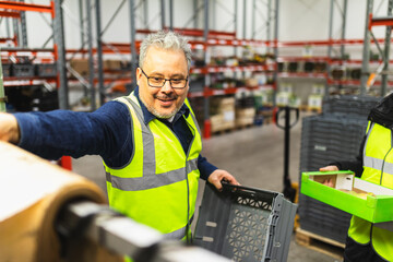 Staff using Industrial weighing scale