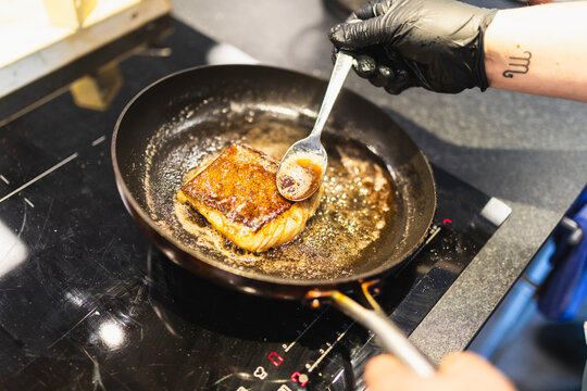 Cod fish in frying pan