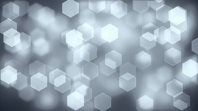 Hexagonal White Bokeh. Abstract Hexagons on a Blurry Soft Background. Looped video.