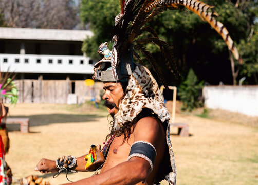 A dancing conchero man in an ancestral ceremony