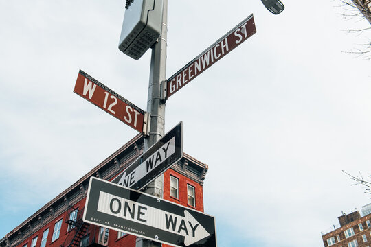 Naklejki Intersection Street Signs in Urban Setting