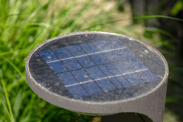 Close-up of Dusty Solar Panel in Nature Setting with Sunlight Reflecting, Renewable Energy Concept, Sustainable Technology Outdoors, Green Energy Solution
