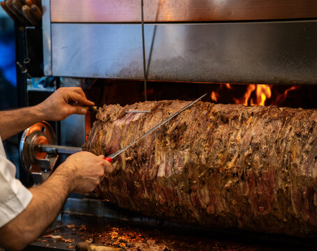 Man Slicing A Tasty Doner Kebab.