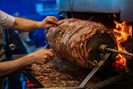 Man Slicing A Tasty Doner Kebab.