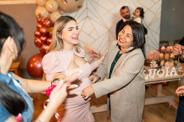 Family celebrating a baby shower.