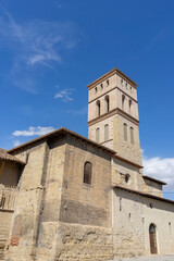 Obraz premium The building has many arched windows and a stone facade. Sunny day at the church of Bartolome. Spain