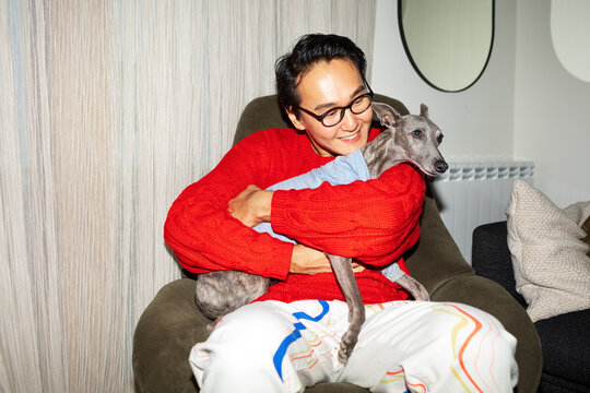 Man hugging his dog