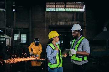 A group of workers wearing safety gear