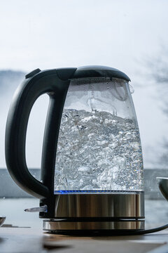 The process of boiling water in a kettle.