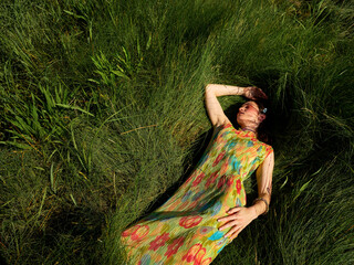 A woman at the grass field