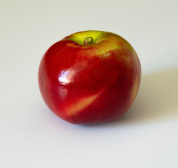 Single apple on a white background