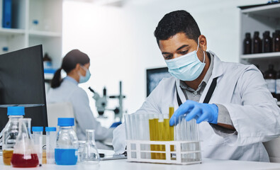 Man, technician and medical research for covid 19, vaccine and test with mask in lab for...