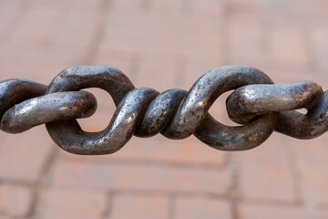 Iron chain with large metal piece