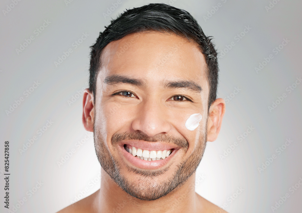 Poster Cosmetics, man and facial cream smile in studio portrait for wellness, hygiene and cleaning. Male person, topless and happy with product in grey background for healthy, smooth skin and lotion