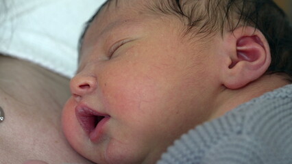 Newborn Resting on Mother's Chest During First Week of Life/ Peaceful Moments in Infant's Early Days, close-up face