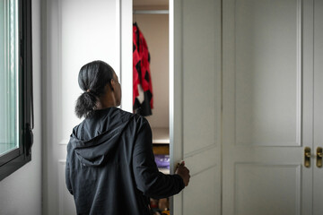 black woman organizing at home