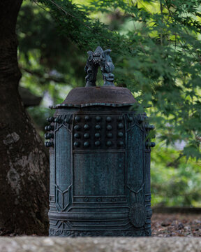 Beneath the Maple Tree, an Ancient Bell.