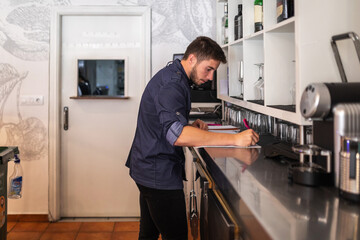 waiter at the bar of a restaurant